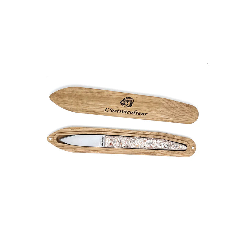 Couteau à huître avec un manche en coquilles St Jacques recyclées