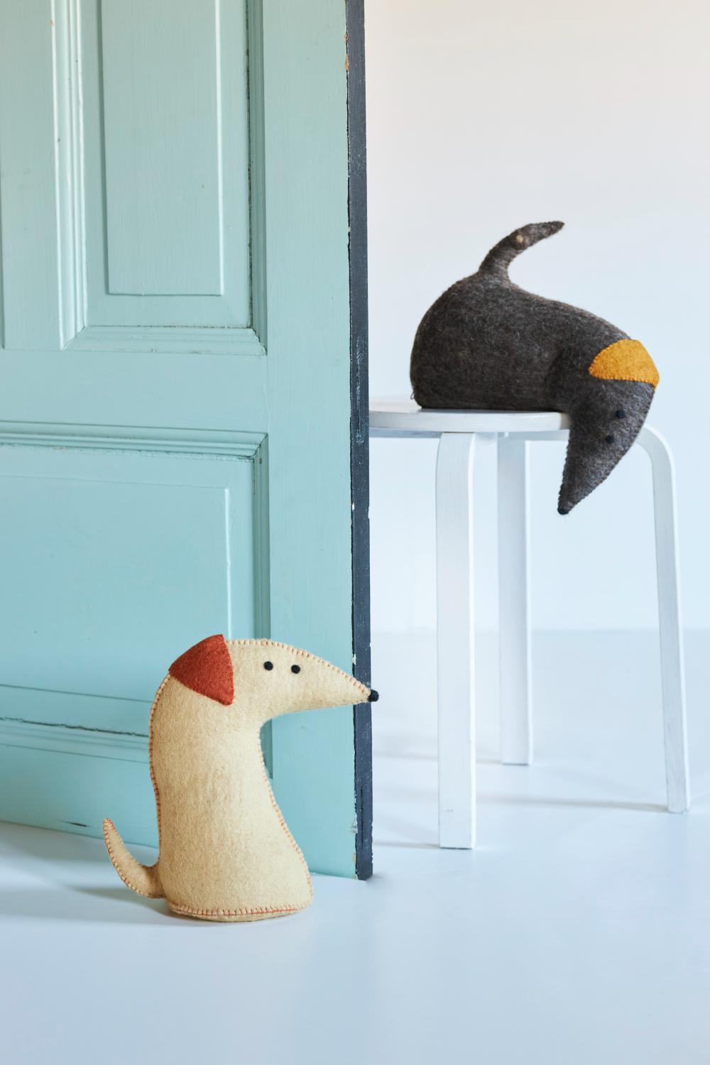 Butée de porte / Serre  livre Chien Beige